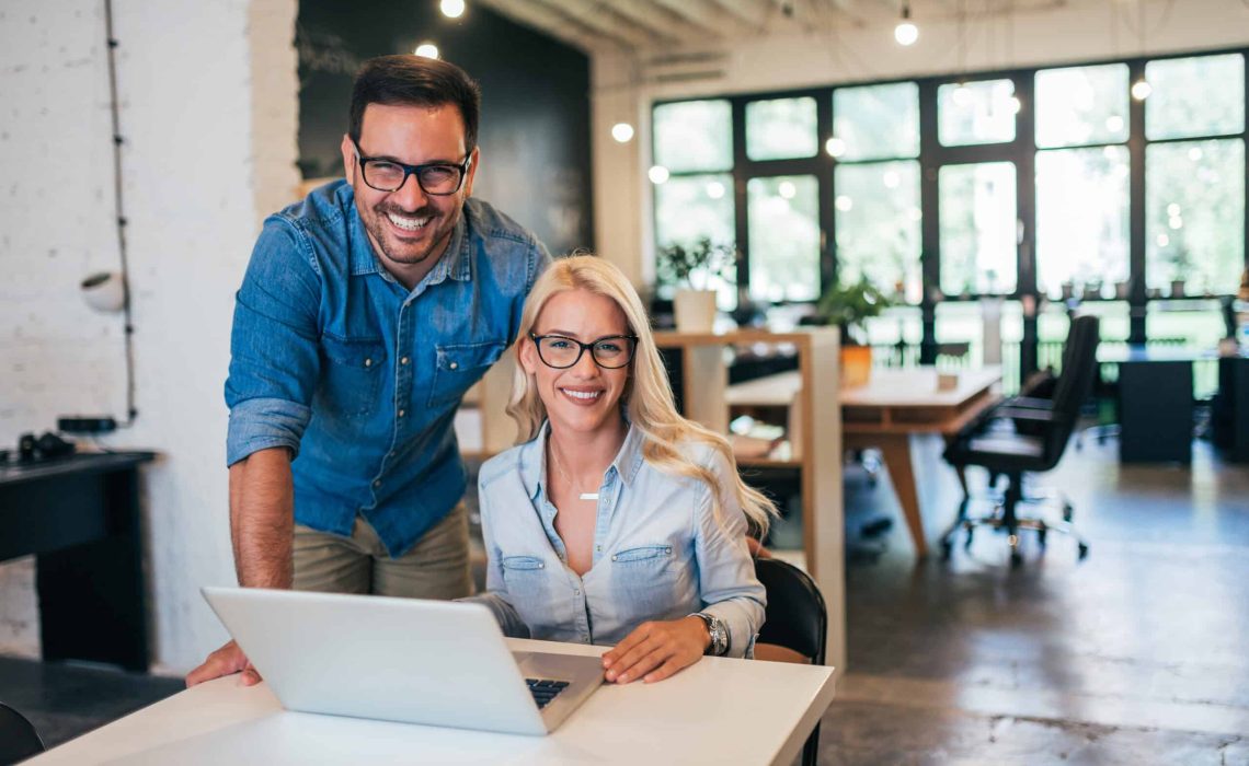 Two creative small business owners at work.